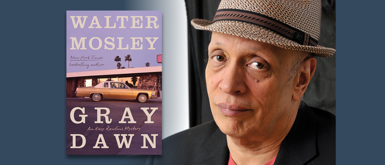 Author Walter Mosley wearing a dark blue checkered blazer and maroon straw fedora hat with the book cover for Gray Dawn.