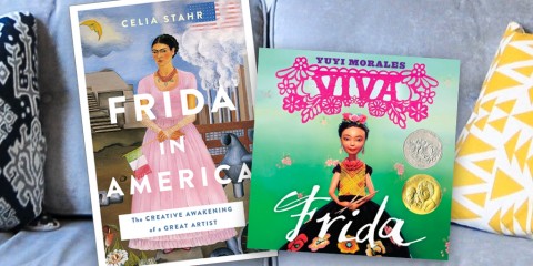 The book covers of Frida in America and Viva Frida next to each other on a couch