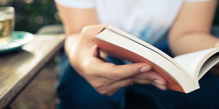 image of a person reading a book